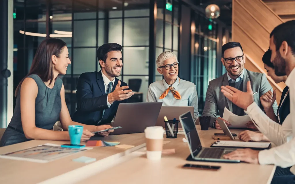 An office team smiling after a successful mold dog inspection