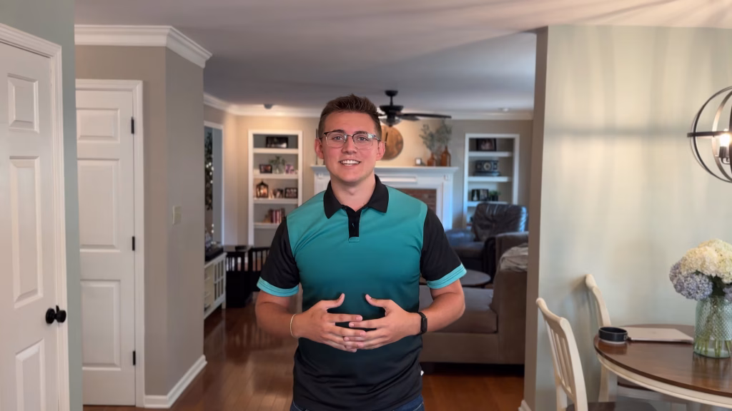 Caleb, co-owner of Mold Dog Network, in a residential home